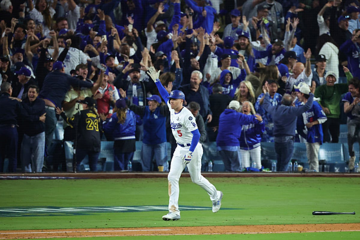 Freddie Freeman of the Los Angeles Dodgers celebrates after hitting a walk-off grand slam during the 10th-inning against the New York Yankees during Game 1 of the 2024 World Series.