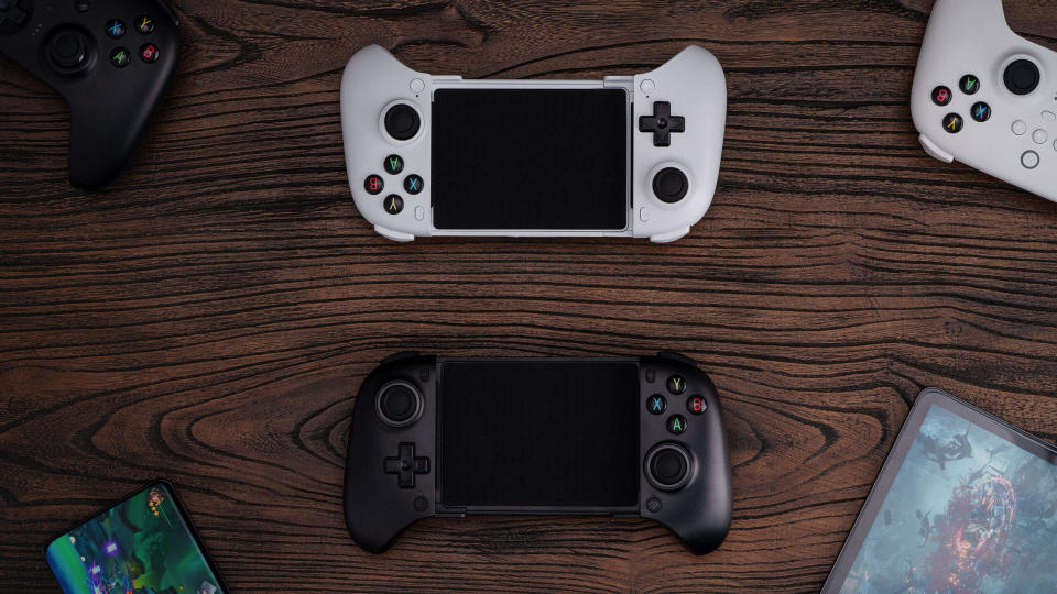 Product photo of two versions of the 8Bitdo Ultimate Mobile Gaming Controller (black and white), arranged vertically in a mirror-like orientation.